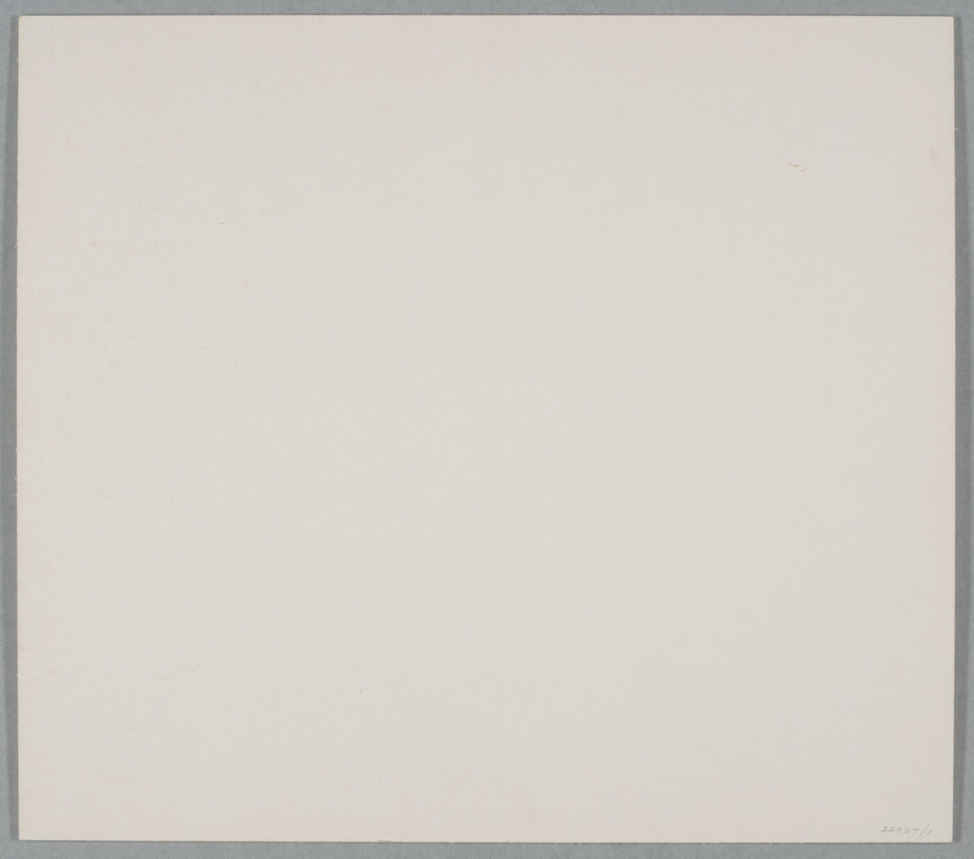 An abstract black-and-white photograph of sand dunes with horizontal and vertical striations that make it seem to be in motion.