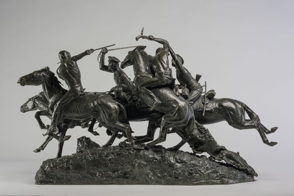 A bronze sculpture of Native American and White figures on horseback fighting with swords and spears.