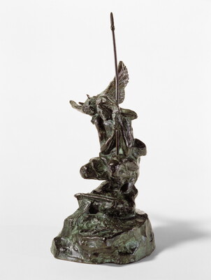 A bronze sculpture of a crouching Indigenous person holding a spear with a open-winged bird perched on their shoulder.