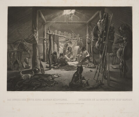 A black-and-white print of several Indigenous people, dogs, and horses inside of a wood structure; hunting equipment, hides, and other items scattered around.