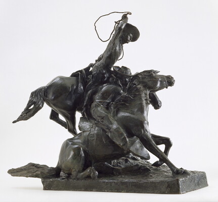 A bronze sculpture of a cowboy on horseback who is about to lasso another horse, its rider holding onto its neck, that is on the ground.