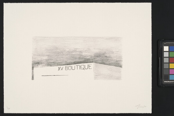 A black-and-white print of a building with "XV Boutique" written across the top of the structure against a dark sky.