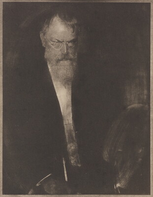 A dark, soft-focus black-and-white portrait photograph of an older White man with glasses looking down and in front of him.