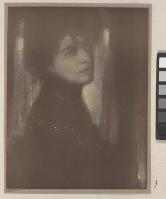 A dark, soft-focus black-and-white portrait photograph of a White woman with her hair up and head turned over her shoulder to face the camera.