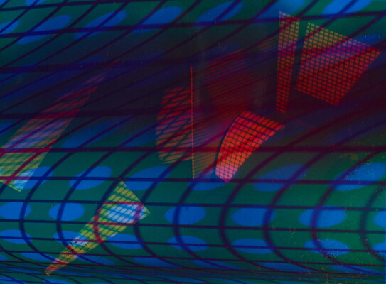An abstract color photograph of multicolored grids of light.