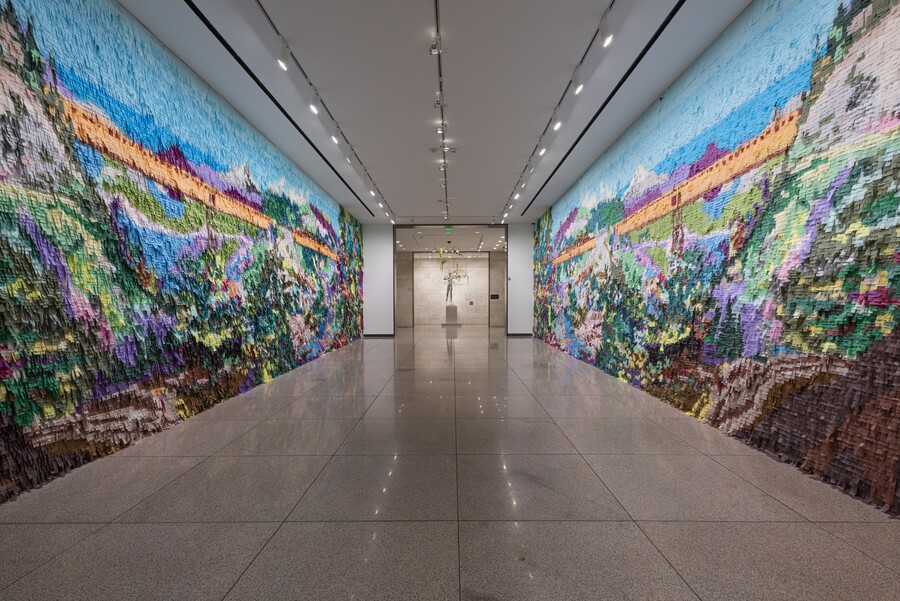 Mural made out of colored pinata paper in a hallway