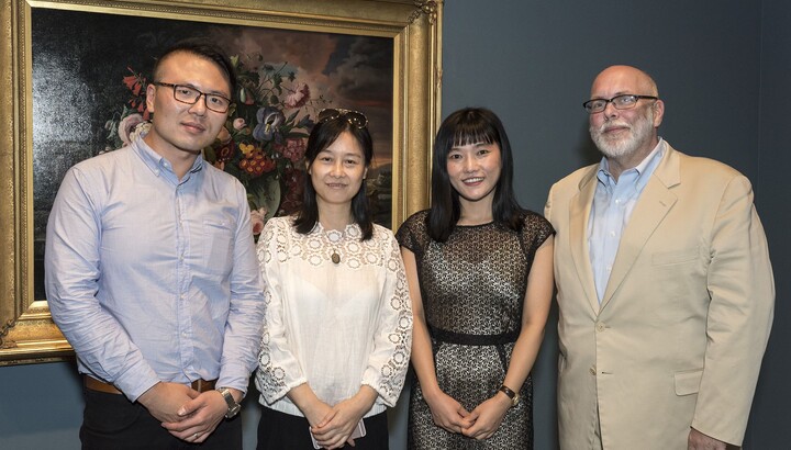 Director Andrew Walker with three scholars from Nanjing University