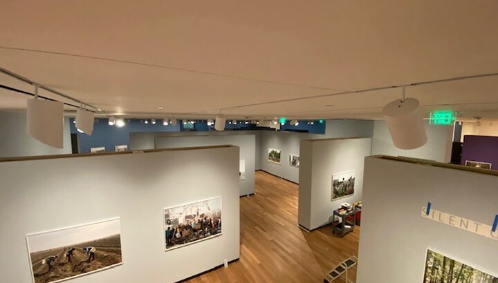 A view of a gallery from above showing a maze of walls