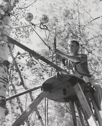 Laura Gilpin (1891–1979), Eliot Porter Setting Up Equipment for Photographing a Lewis' Woodpecker, New Mexico, 1952