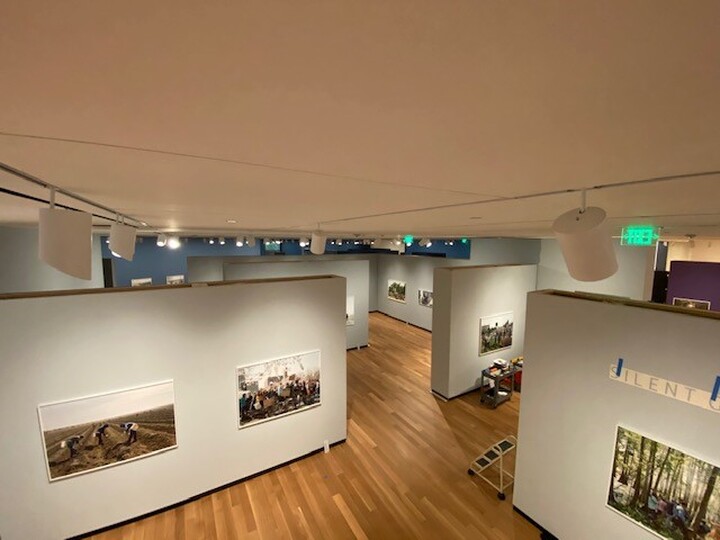 A view of a gallery from above showing a maze of walls