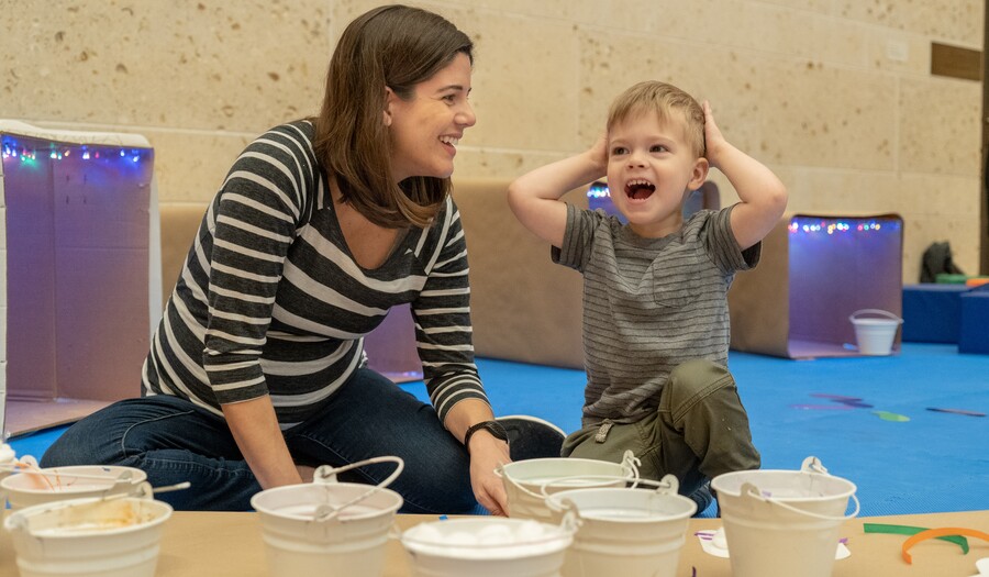 mom and toddler playing