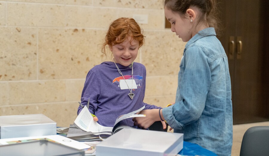 two girls participating in a homeschool class